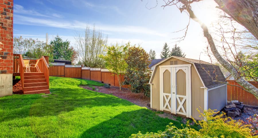 Fenced backyard with storage shed in Elizabethtown